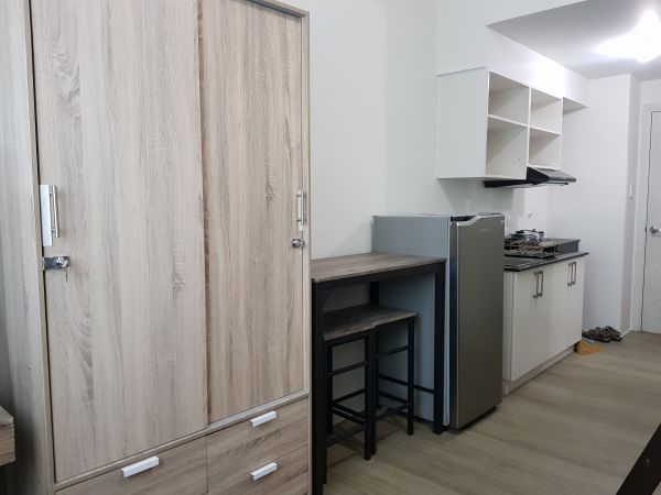 Fully Furnished condo unit opposite Ateneo, Mirriam and UP Diliman